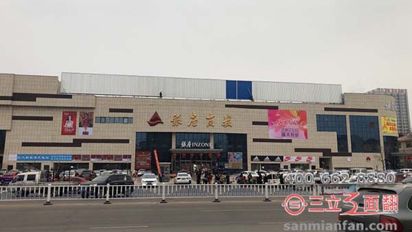 山東泰安市銀座商場樓頂三面翻大型廣告牌案例施工圖片
