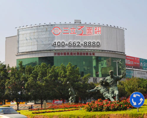 云南開遠(yuǎn)弧形樓頂三面翻廣告牌案例施工圖片